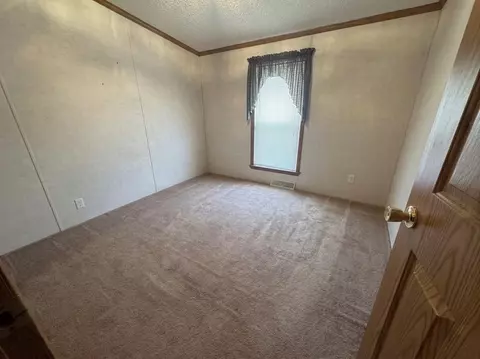 Bedroom - 305 Cedar St, Cheboygan, MI 49721 photo 2 of 4