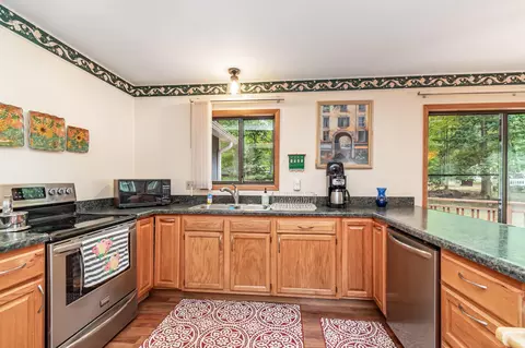 Kitchen - 410 Peach Rd, Roscommon, MI 48653 photo 2 of 2