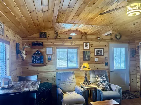Living - 1304 Tabitha Trail Apt 10- Acres Trl #10+/- ACRES, Mio, MI 48647 photo 2 of 4