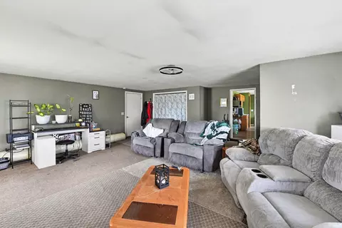 Living - 7207 Airport Rd, Vanderbilt, MI 49795 photo 1 of 2