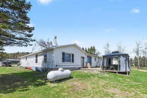 Exterior - 7207 Airport Rd, Vanderbilt, MI 49795 photo 3 of 8