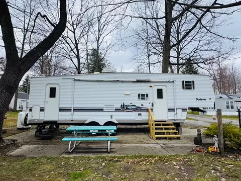 2757 Owens Unit 205 Dr, Houghton Lake, MI 48629