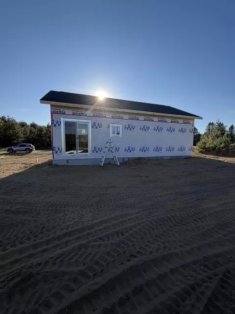 Exterior - 8513 Grant Rd, Mancelona, MI 49659 photo 5 of 6
