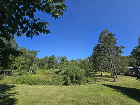 Exterior - 1540 Winding Trl, Fairview, MI 48621 photo 16 of 49