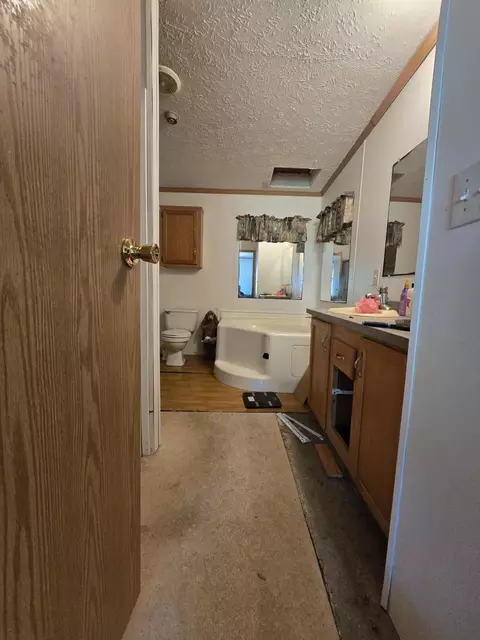 Bath - 1540 Winding Trl, Fairview, MI 48621 photo 2 of 3