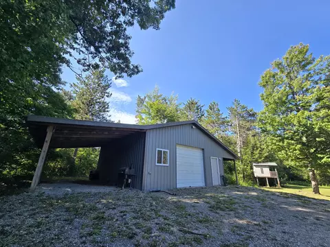 Exterior - 1540 Winding Trl, Fairview, MI 48621 photo 10 of 49