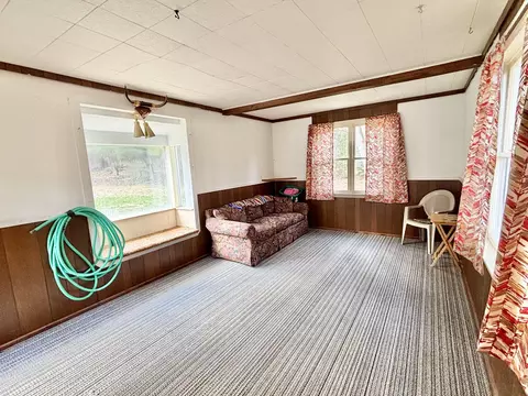 Living - 1065 N Abbe Rd, Fairview, MI 48621 photo 7 of 7