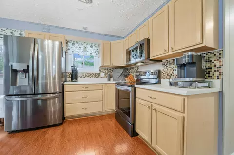 Kitchen - 144 Canton St, Roscommon, MI 48653 photo 5 of 7