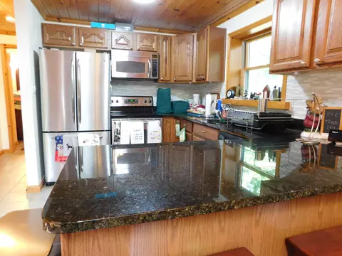 Kitchen - 11809 Bear Track Trl, Frederic, MI 49733 photo 3 of 4