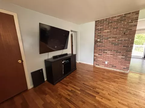 Living - 1098 Wayne Rd, Alpena, MI 49707 photo 2 of 2