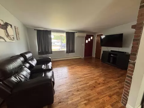 Living - 1098 Wayne Rd, Alpena, MI 49707 photo 1 of 2