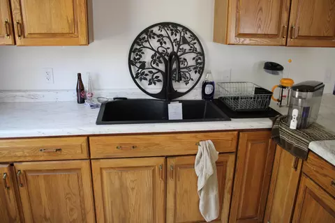 Kitchen - 4606 N Mount Tom Rd, Comins, MI 48619 photo 5 of 5