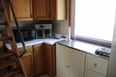 Kitchen - 4606 N Mount Tom Rd, Comins, MI 48619 photo 4 of 5