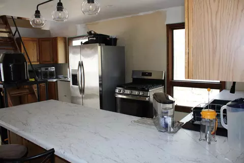 Kitchen - 4606 N Mount Tom Rd, Comins, MI 48619 photo 2 of 5