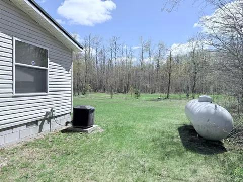 Exterior - 9518 Greenway Dr, Frederic, MI 49733 photo 3 of 5