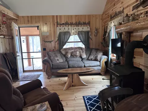 Living - 3591 Comstock Rd, Luzerne, MI 48636 photo 3 of 3