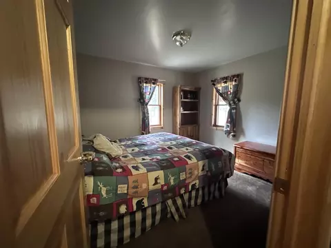 Bedroom - 3591 Comstock Rd, Luzerne, MI 48636 photo 2 of 2
