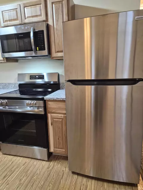Kitchen - 208 E Loves Dr, Roscommon, MI 48653 photo 10 of 11