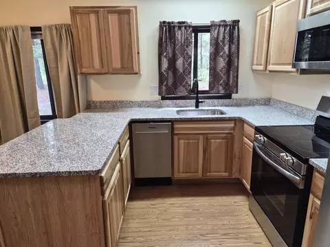 Kitchen - 208 E Loves Dr, Roscommon, MI 48653 photo 4 of 11