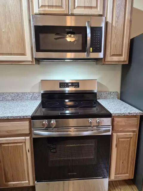 Kitchen - 208 E Loves Dr, Roscommon, MI 48653 photo 9 of 11