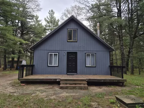 Exterior - 208 E Loves Dr, Roscommon, MI 48653 photo 3 of 10
