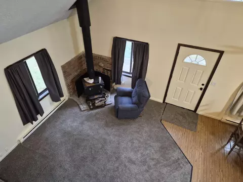 Living - 208 E Loves Dr, Roscommon, MI 48653 photo 4 of 6