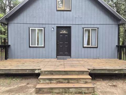 Exterior - 208 E Loves Dr, Roscommon, MI 48653 photo 7 of 10