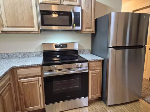 Kitchen - 208 E Loves Dr, Roscommon, MI 48653 photo 7 of 11