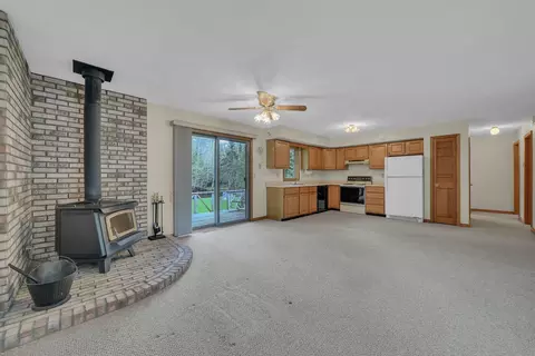 Living - 1758 Dewitt Trl, Roscommon, MI 48653 photo 6 of 6