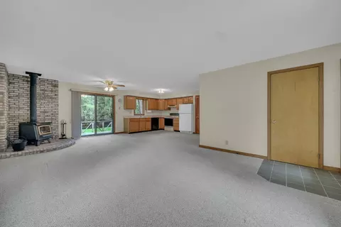 Living - 1758 Dewitt Trl, Roscommon, MI 48653 photo 5 of 6