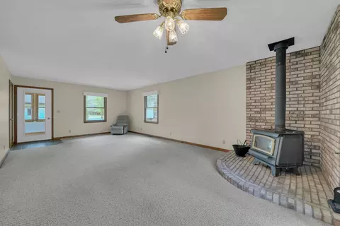 Living - 1758 Dewitt Trl, Roscommon, MI 48653 photo 2 of 6