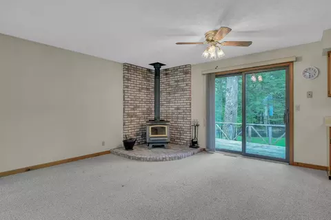 Living - 1758 Dewitt Trl, Roscommon, MI 48653 photo 1 of 6