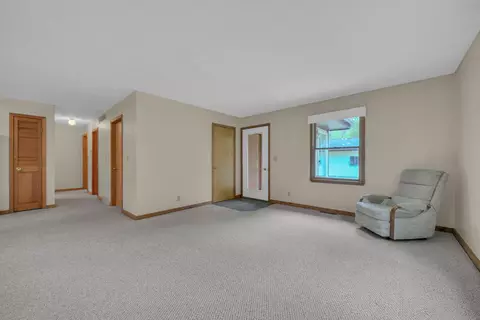 Living - 1758 Dewitt Trl, Roscommon, MI 48653 photo 3 of 6