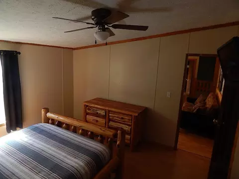 Bedroom - 2389 W Maplehurst Dr, Roscommon, MI 48653 photo 3 of 4