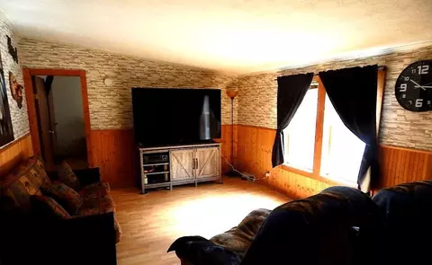 Living - 2389 W Maplehurst Dr, Roscommon, MI 48653 photo 3 of 4