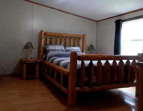 Bedroom - 2389 W Maplehurst Dr, Roscommon, MI 48653 photo 2 of 4