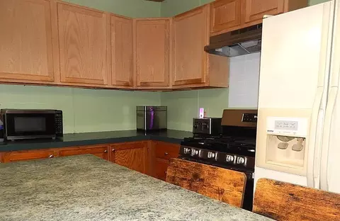 Kitchen - 2389 W Maplehurst Dr, Roscommon, MI 48653 photo 2 of 5