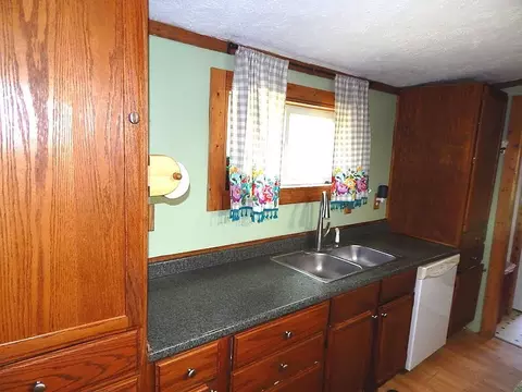 Kitchen - 2389 W Maplehurst Dr, Roscommon, MI 48653 photo 4 of 5