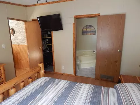 Bedroom - 2389 W Maplehurst Dr, Roscommon, MI 48653 photo 1 of 4