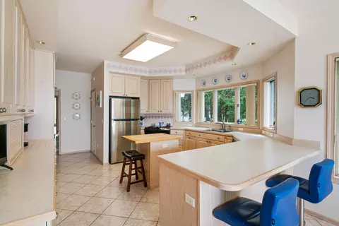 Kitchen - 4457 E Burt Lake Rd, Cheboygan, MI 49721 photo 2 of 4