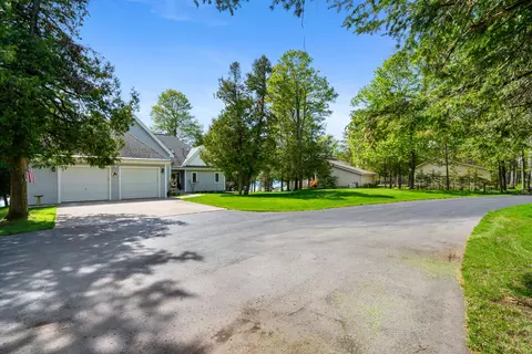 Exterior - 4457 E Burt Lake Rd, Cheboygan, MI 49721 photo 7 of 15