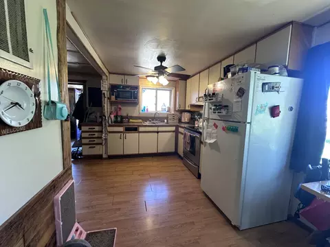 Kitchen - 1427 N Abbe Rd, Fairview, MI 48621 photo 3 of 5