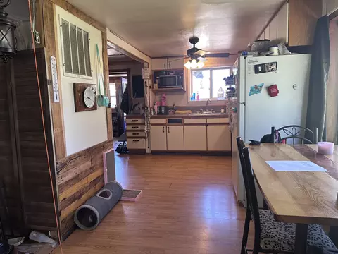 Kitchen - 1427 N Abbe Rd, Fairview, MI 48621 photo 4 of 5