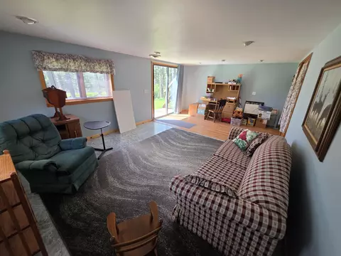 Living - 1470 Helmer Lake Rd, Fairview, MI 48621 photo 5 of 5
