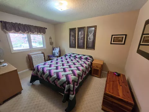 Bedroom - 1470 Helmer Lake Rd, Fairview, MI 48621 photo 4 of 11