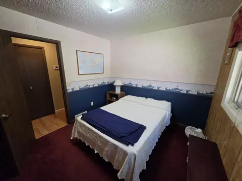 Bedroom - 1470 Helmer Lake Rd, Fairview, MI 48621 photo 8 of 11
