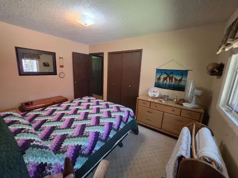 Bedroom - 1470 Helmer Lake Rd, Fairview, MI 48621 photo 6 of 11