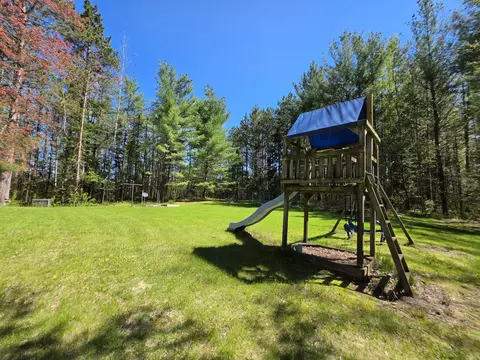 Exterior - 1470 Helmer Lake Rd, Fairview, MI 48621 photo 22 of 36