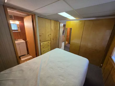 Bedroom - 1470 Helmer Lake Rd, Fairview, MI 48621 photo 10 of 11