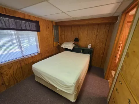 Bedroom - 1470 Helmer Lake Rd, Fairview, MI 48621 photo 9 of 11